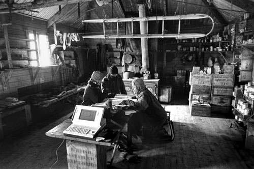 <p>Members of the New Zealand-based Antarctic Heritage Trust discuss the preservation of artifacts in Shackleton&rsquo;s hut, built at Cape Royds in 1908.</p><p>&ldquo;In 1949 my father moved us to Oamaru, south of Christchurch. That was where the first news of Scot&rsquo;s death was sent around the world. This history fired up my interest in Antarctica. We have everything on inventory. Through detailed research of expedition stores lists it&rsquo;s possible to source material because much has been moved from one building to another by early expedition people themselves.&rdquo;<br/>—David Harrowfield (right)</p>