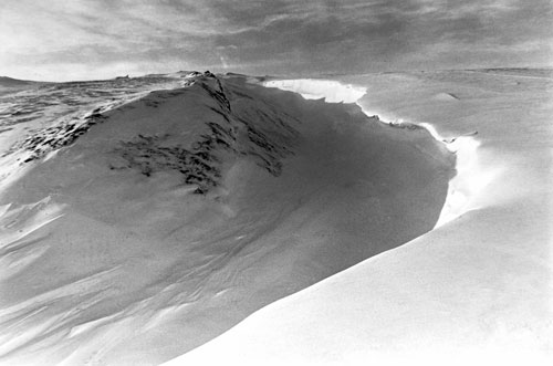 Each day the science team climbs up to the edge of the crater. The camp is a bit below the crater because the volcano occasionally bombards the rim with lava bombs. They are made of "Erebus crystals", a form of felspar, referred to by the scienstists as "Antarctichite."